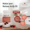 Eine Flasche Krill Vida steht auf einem Holzuntergrund, daneben liegen Krillöl-Kapseln. Auf dem Etikett wird reines, in der Schweiz hergestelltes Krillöl hervorgehoben – ideal für alle, die Omega-3-Fettsäuren kaufen möchten, da es pro Portion EPA und DHA enthält.