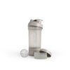 Auf weißem Hintergrund ist ein transparenter Shaker „Blender Bottle Prostak Pro“ mit Schraubdeckel, Mixkugel aus Metall, zwei herausnehmbaren Fächern und kingnature-Etikett abgebildet.